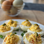 a close up of deviled eggs on a plate