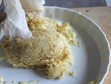 shredded potatoes unwrapped in pan