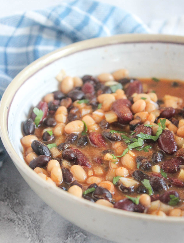 A close up picture of slow cooked beans in a bowl