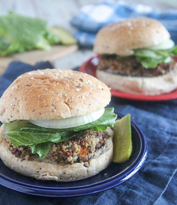 veggie burgers in rolls on plates