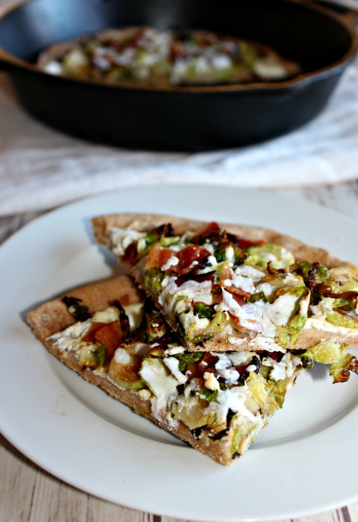 Skillet pizza with brussels sprouts bacon and cheese simpleandsavory.com