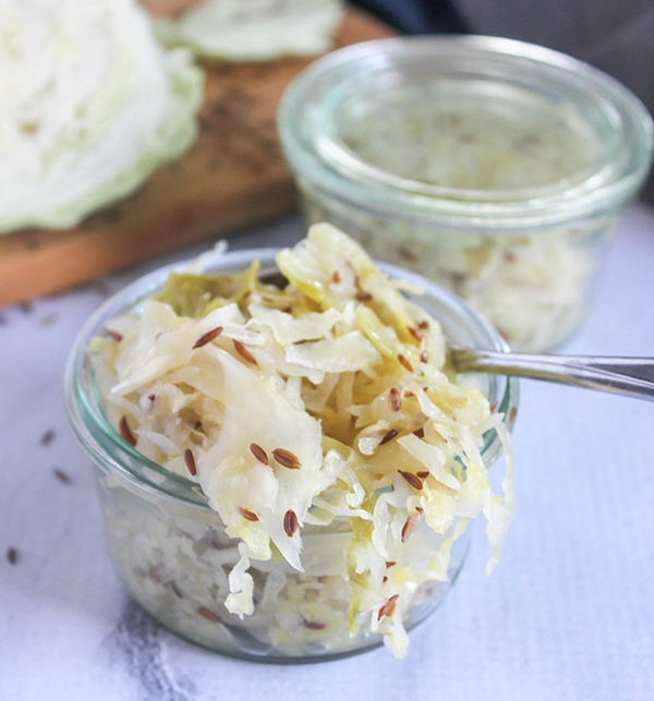 sauerkraut in a small jar with another in the background