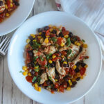 Partial bowl chili chicken overhead