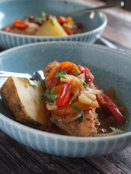 Slow cooked chipotle chicken in a blue bowl