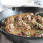 Homemade baked Swedish meatballs in a cast iron pan