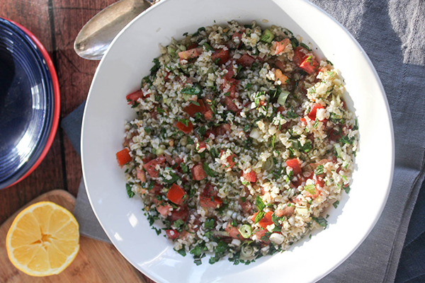 an overhead view of cauliflower tabbouleh in a bowl