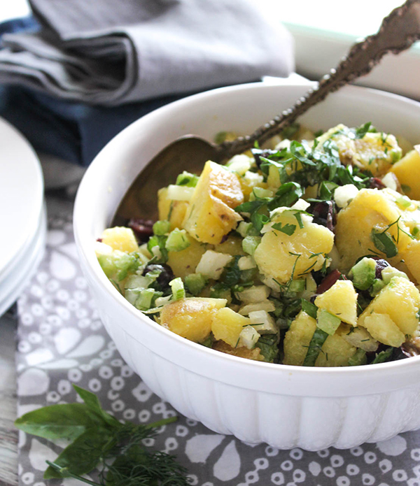 a close up of healthy potato salad in a bowl