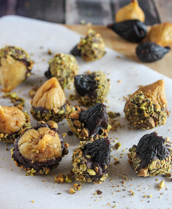 dried figs dipped in chocolate with pistachios