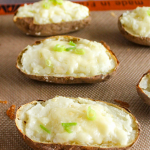 Healthy twice baked potatoes on a baking sheet
