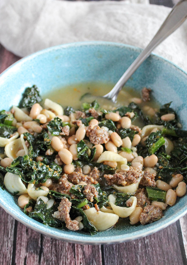 Sausage and kale soup in a bowl
