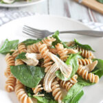 spinach pasta salad on a plate