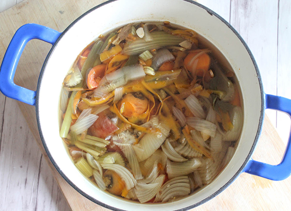 Vegetable scraps in a pot with water for broth