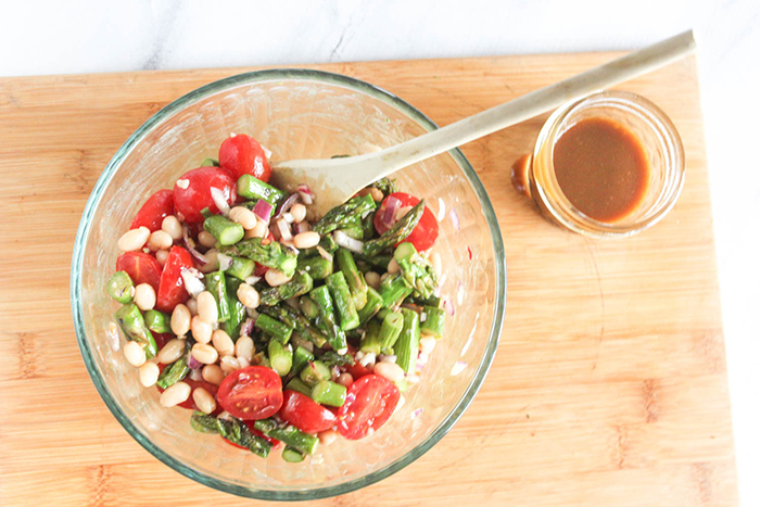 an overhead view of the salad stirred up