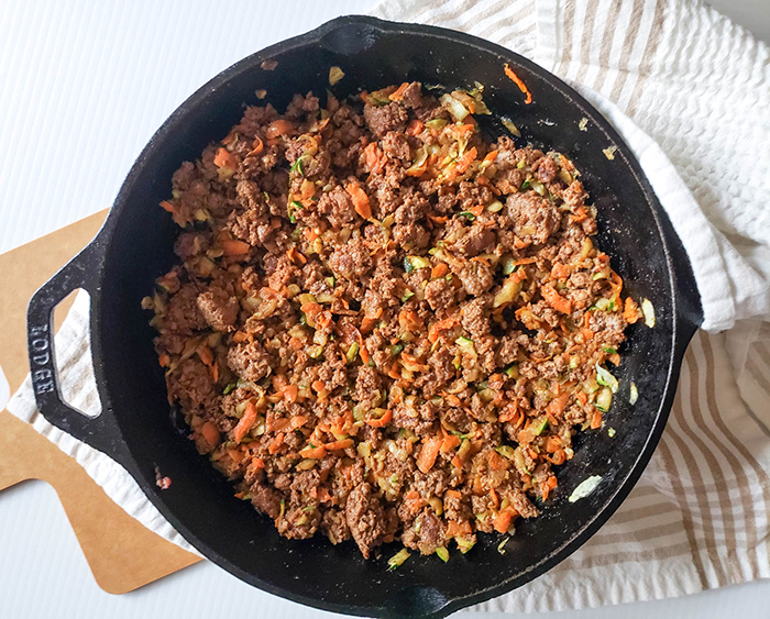 an-overhead-view-of-the-finished-taco-meat-with-vegetables