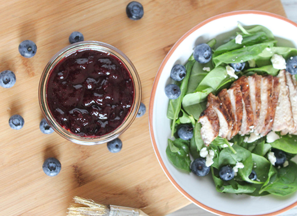 blueberry barbecue sauce with chicken in a salad