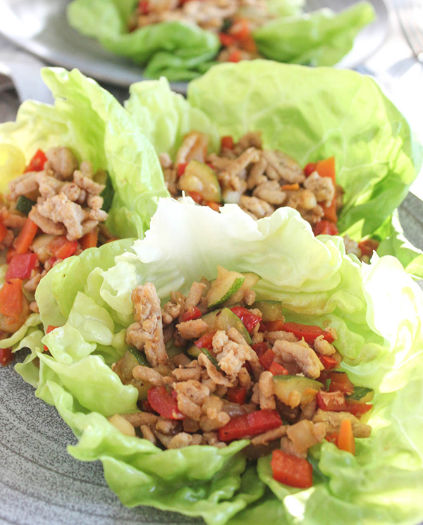 Asian Chicken Lettuce Wraps with vegetables on a plate