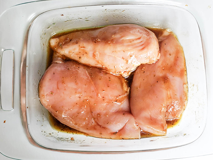 an overhead shot of chicken marinating