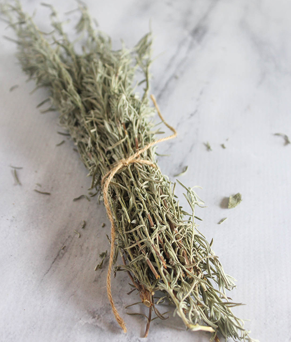 dried rosemary to tied to show how to hang and dry fresh herbs