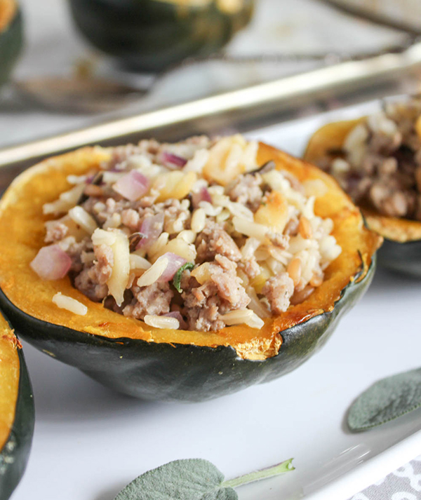 one half of acorn squash on a platter