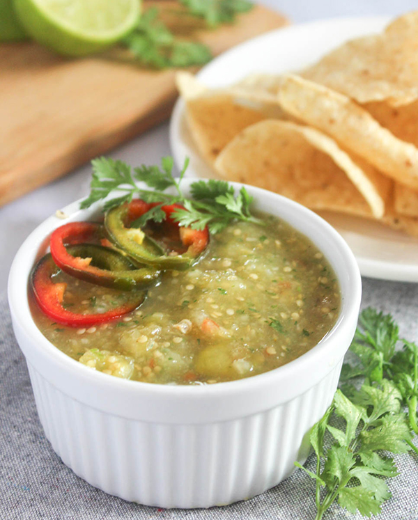 salsa verde in a dish with jalapenos on top