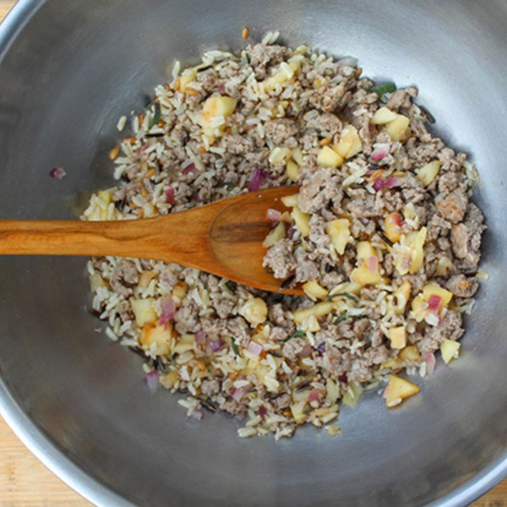 stuffing mixture all mixedup in a mising bowl