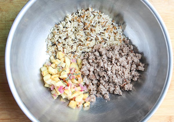 Sausage apples and rice before they are mixed up