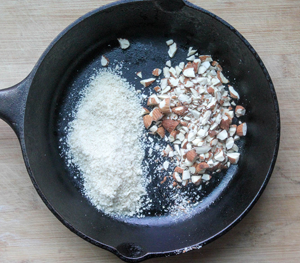 bread crumbs and chopped almonds in a skillet