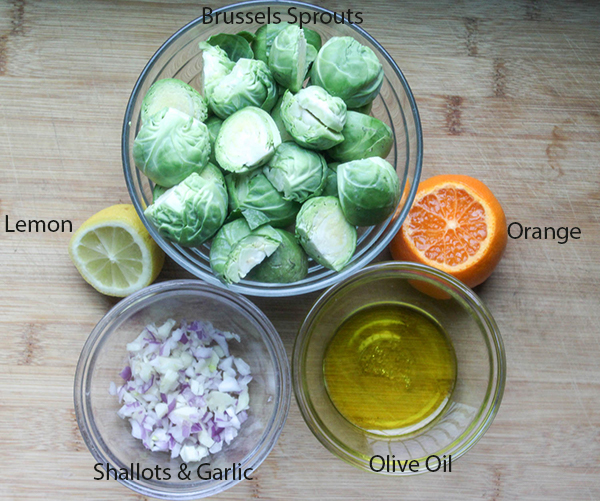 Brussels sprouts lemon orange shallots olive oil - the ingredients for easy roasted Brussles Sprouts