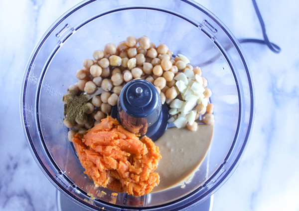 Sweet potatoes, chickpeas, tahini sauce, garlic and cumin in a food processor