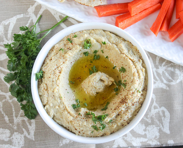 a view looking down at hummus in bowl