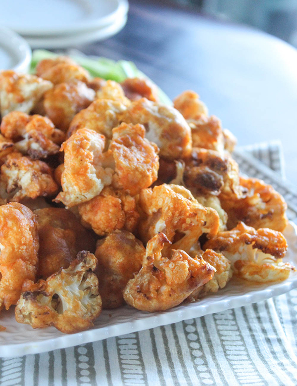 A picture of a plate of buffalo cauliflower