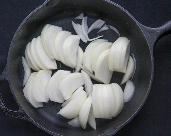 Raw onions in a pan