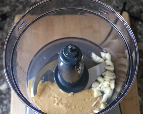 process 1 garlic and tahini in a food processor