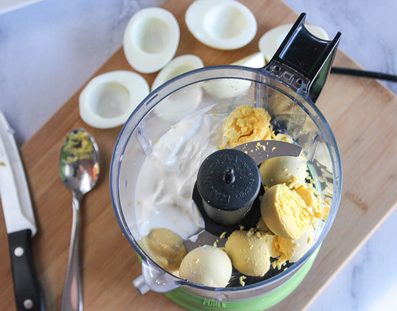 Egg yolks, yogurt and mustard in a food processor