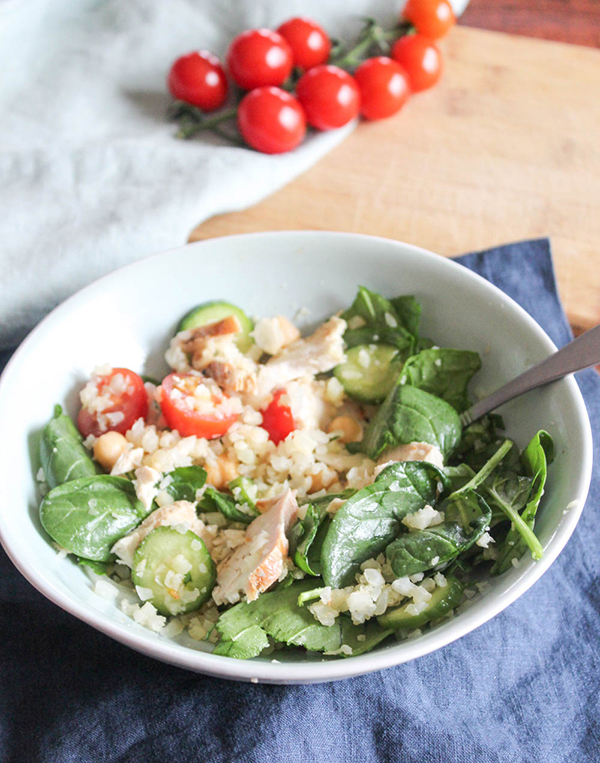 The ingrediets mixed up in a bowl with a fork