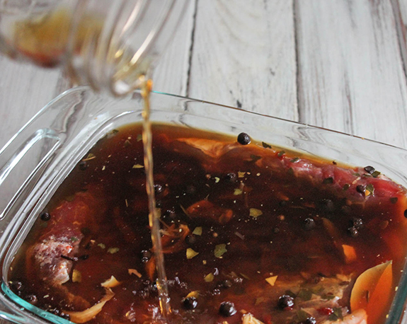 brine pouring over meat