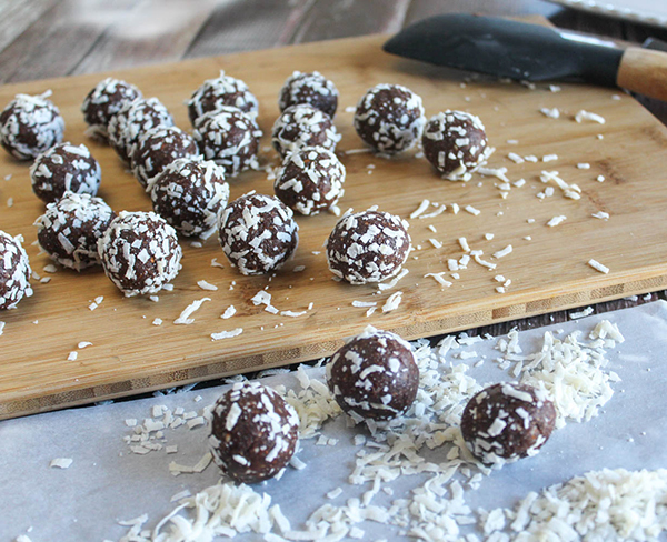 Balls rolled in coconut on a board