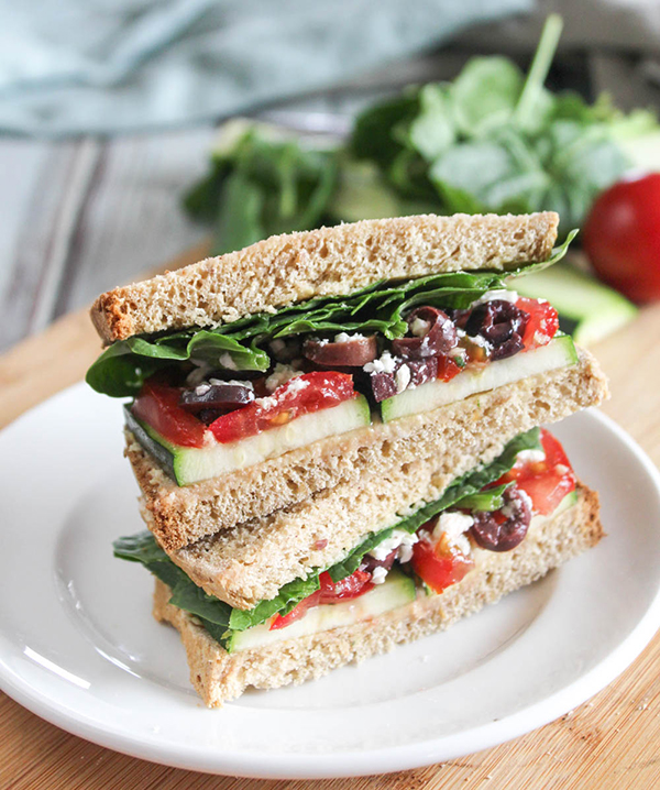 mediterranean vegetable sandwich stacked on a plate