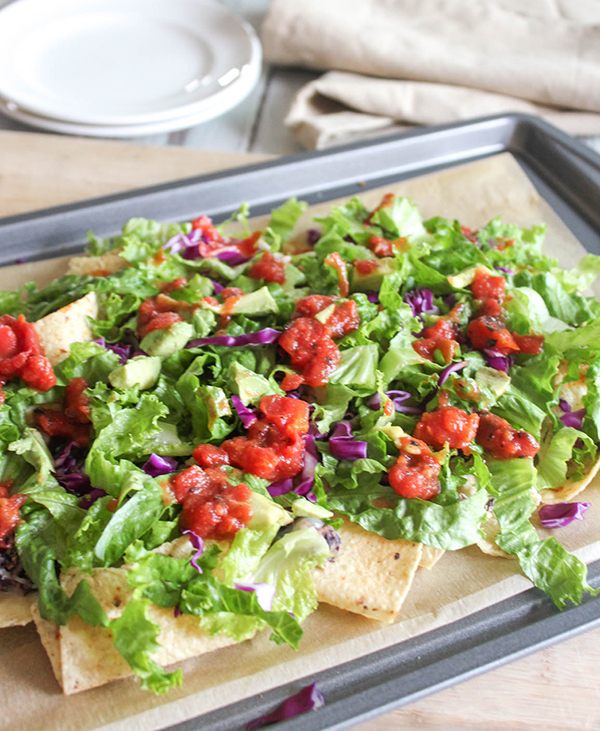 Sheet pan nacho salad on a pan