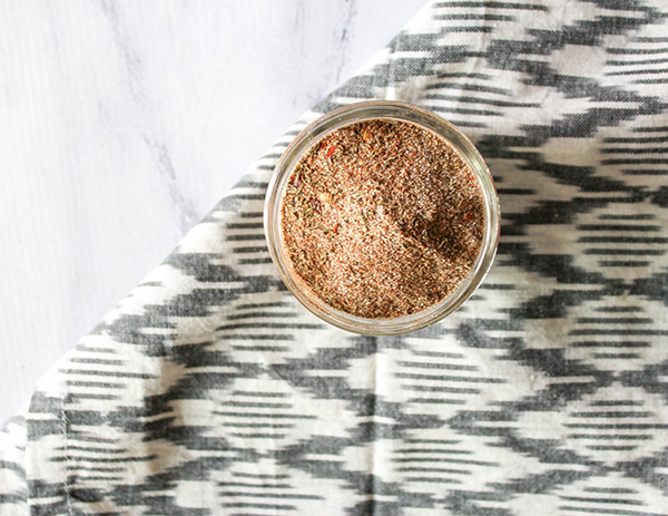 an overhead view of the spice blend in a jar