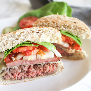 a close up of a beef burger