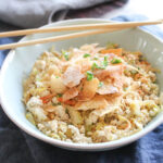 egg roll in a bowl with chop sticks