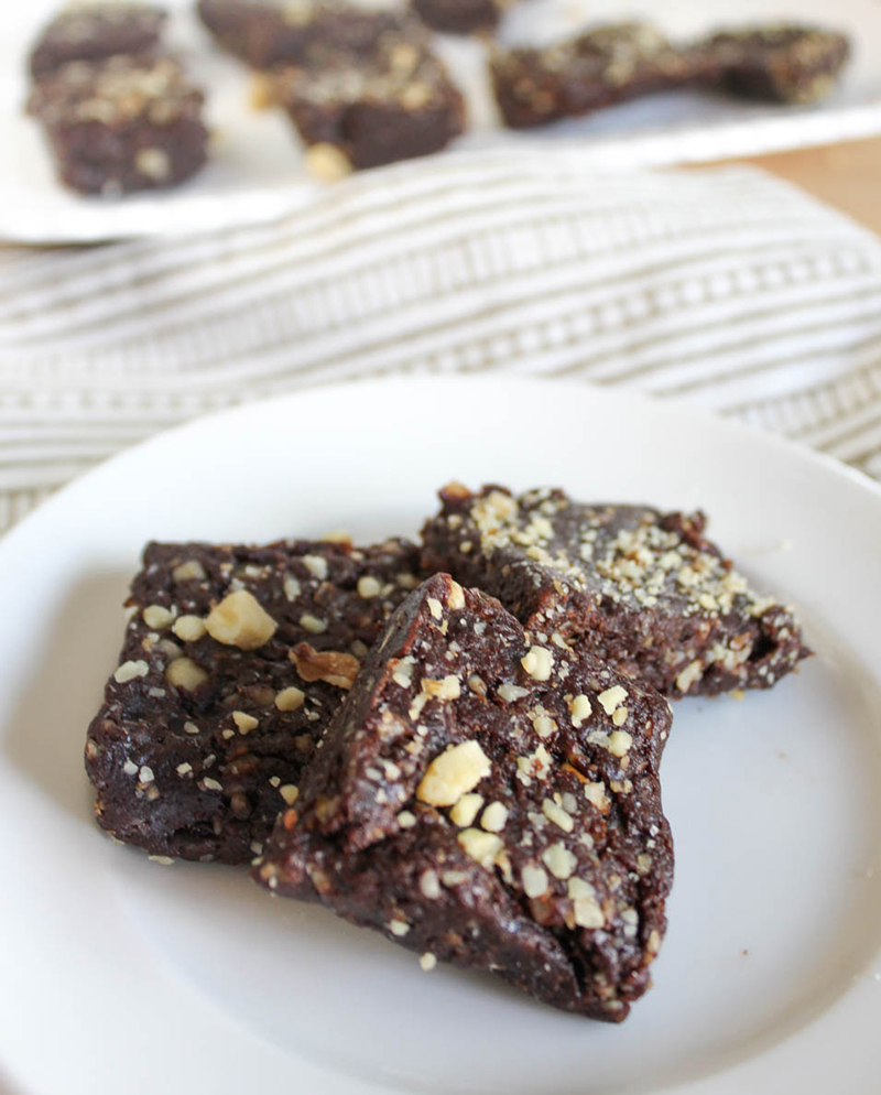 three brownies on a white plate