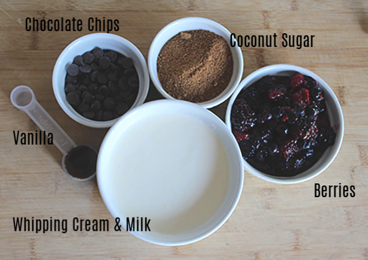 The ingredients: chocolate chips, coconut sugar, vanilla, whipping cream and milk, berries 