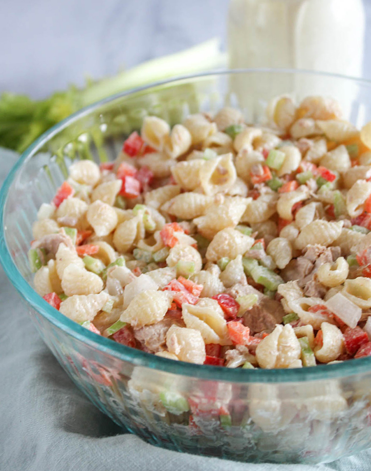 Healthy macaroni salad with tuna in a blass bowl