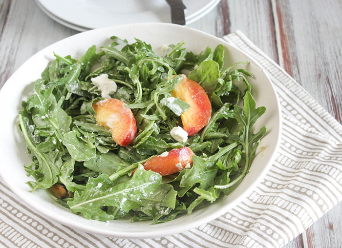 A view of the completed salad in a white bowl