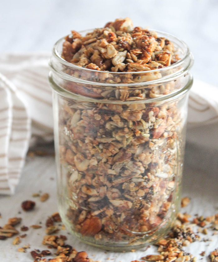 a mason jar filled with granola