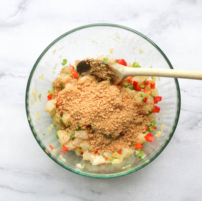 a picture of shrimp cake ingredients in a bowl not mixed