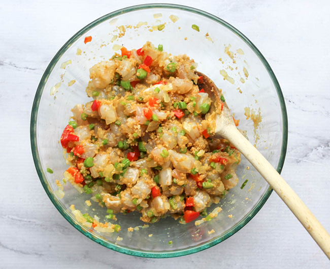 shrimp cake mixture in a large bowl mixed together