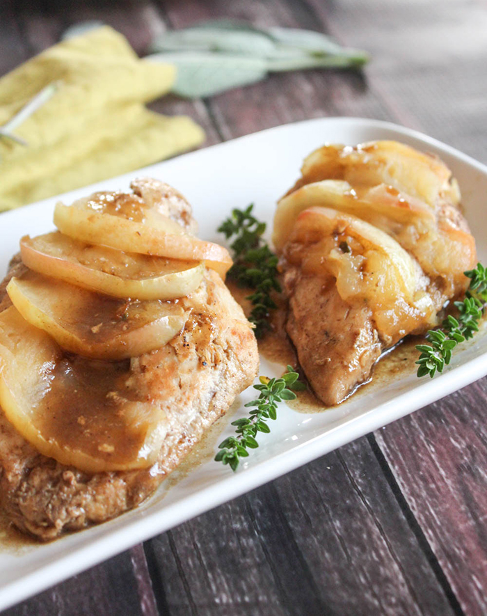 A close up photo of apple cider chicken on a plate
